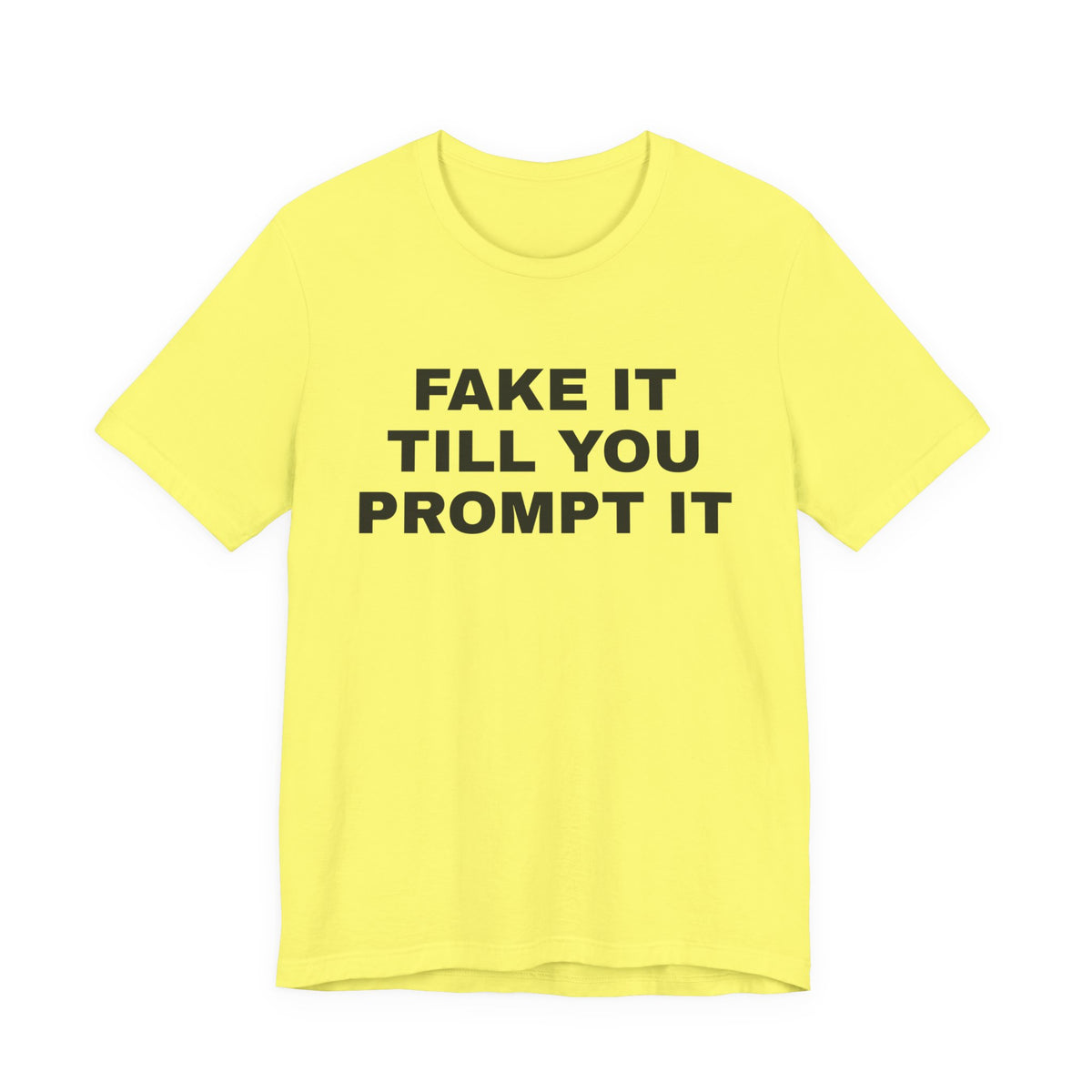 Yellow t-shirt printed with 'Fake it till you prompt it'