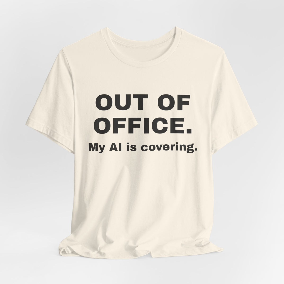 Natural t-shirt printed with 'Out of office. My AI is covering.'