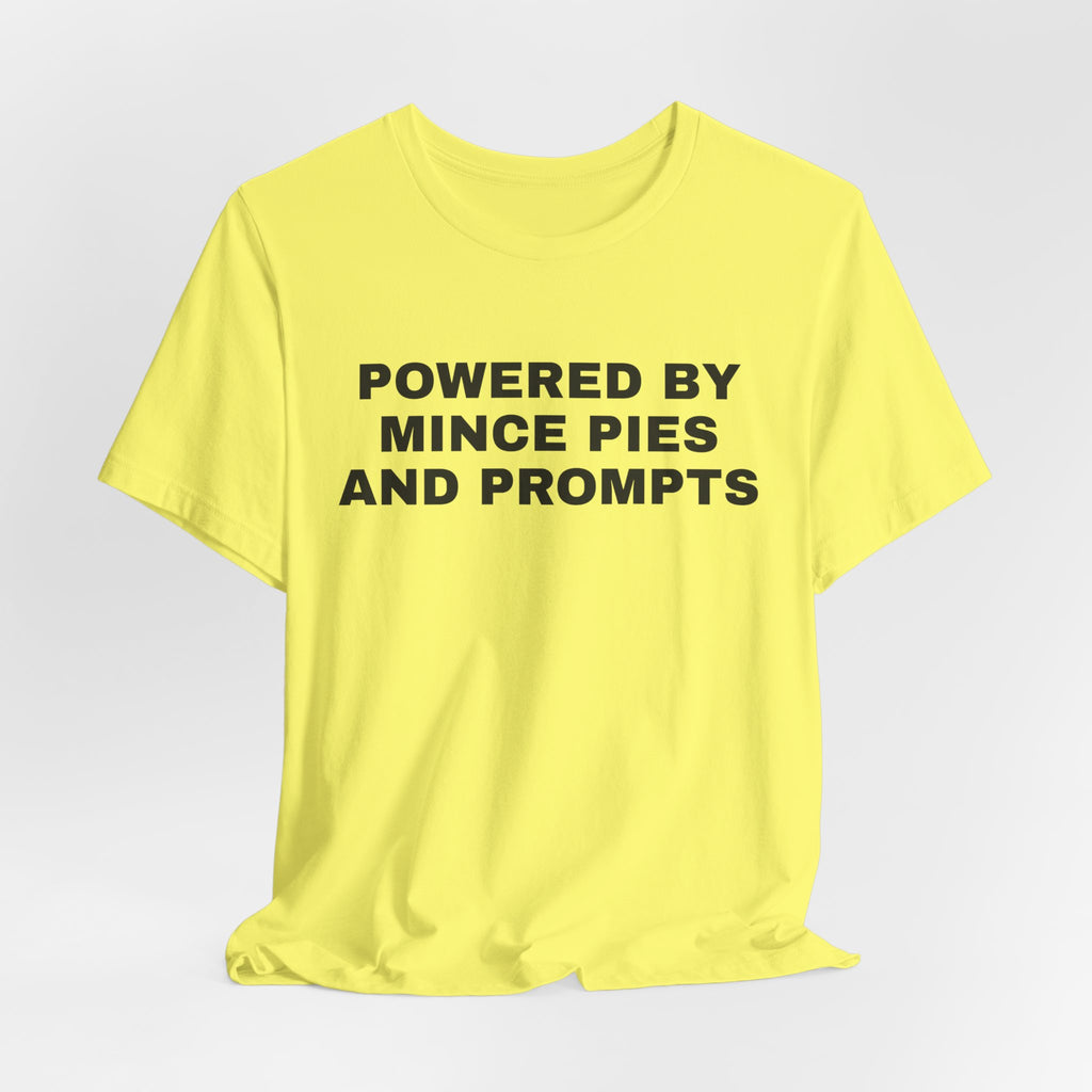 Yellow t-shirt printed with 'Powered by Mince Pies and Prompts'