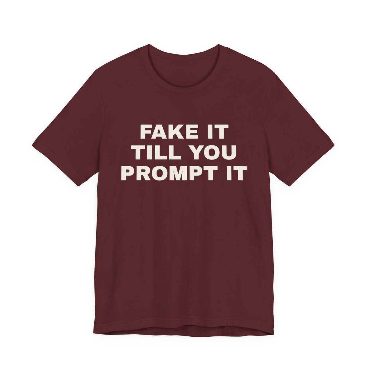Maroon t-shirt printed with 'Fake it till you prompt it'