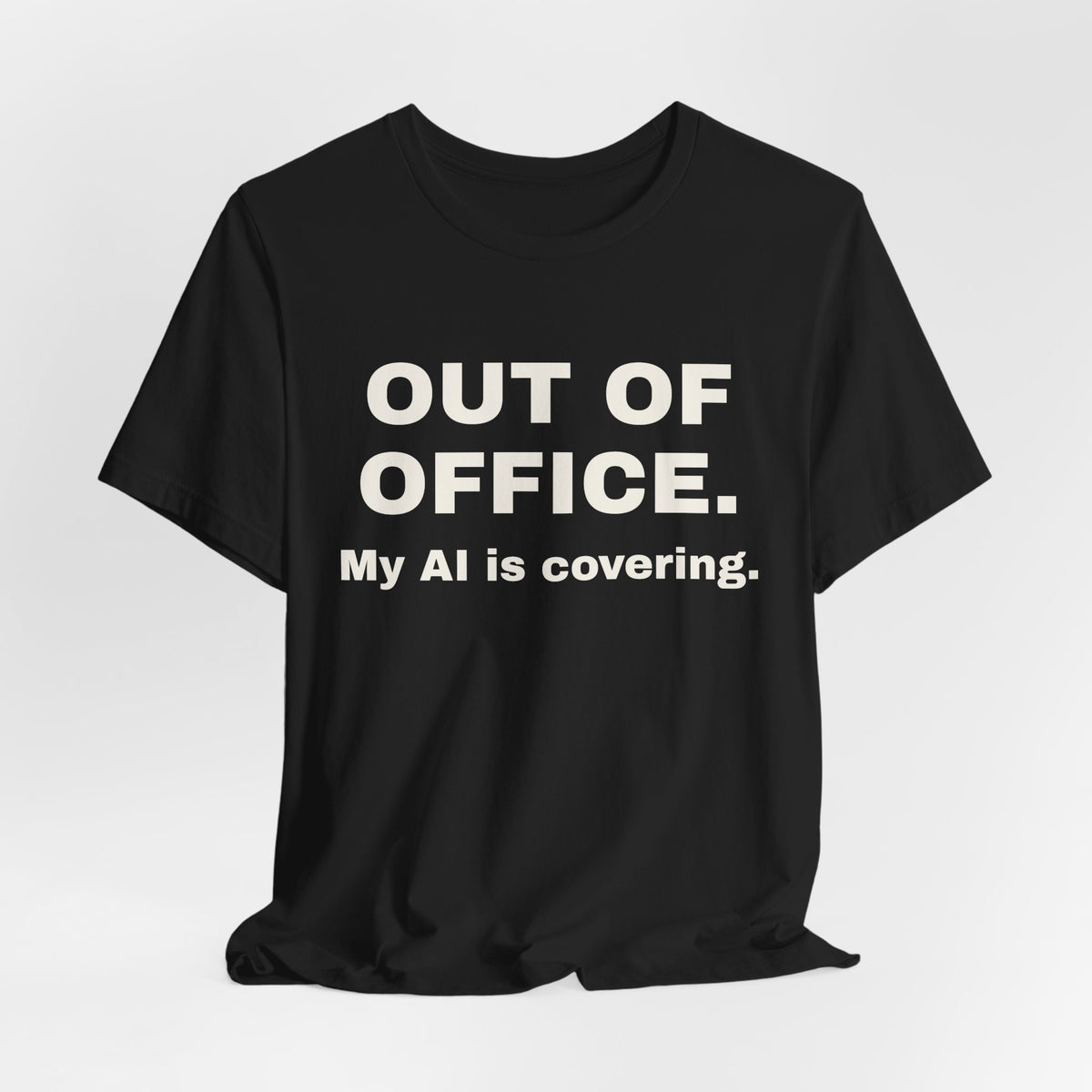 Black t-shirt printed with 'Out of office. My AI is covering.'