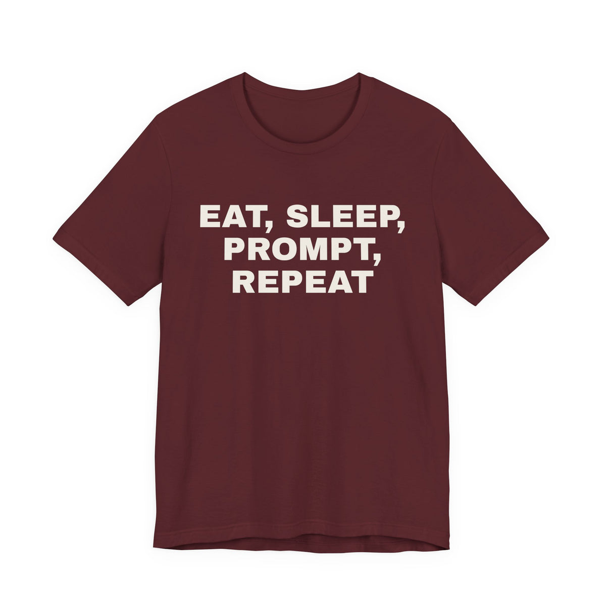 Maroon t-shirt printed with 'Eat, sleep, prompt, repeat'