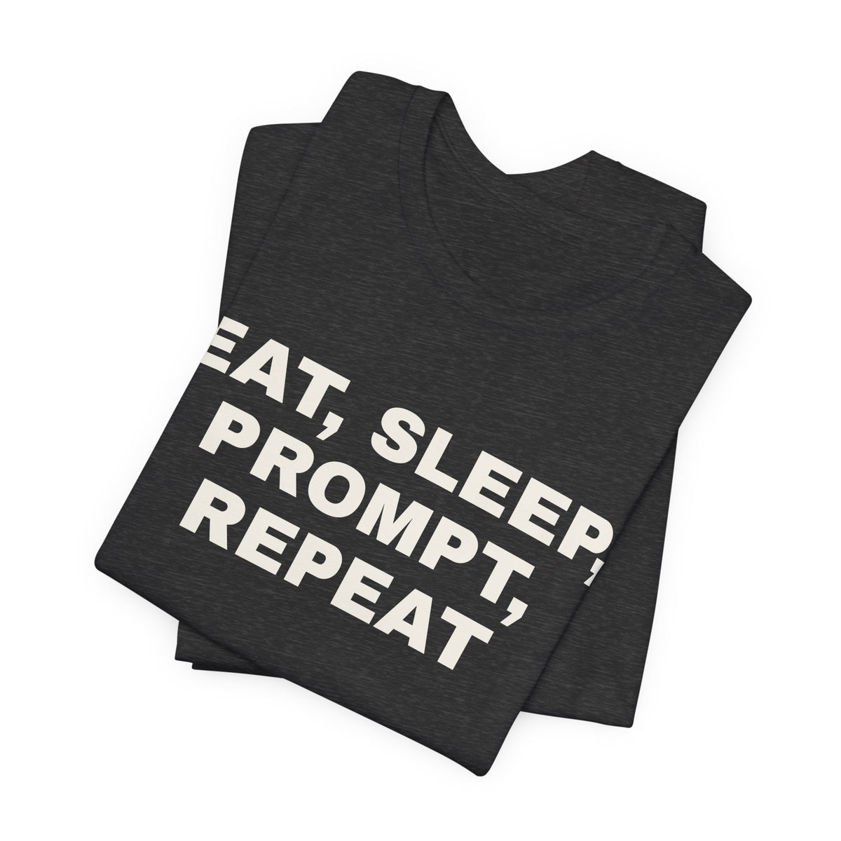 Dark grey heather t-shirt printed with 'Eat, sleep, prompt, repeat', folded