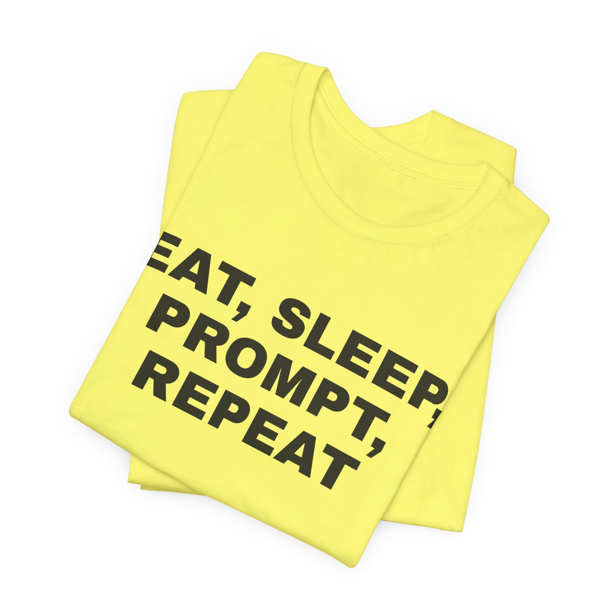 Yellow t-shirt printed with 'Eat, sleep, prompt, repeat', folded