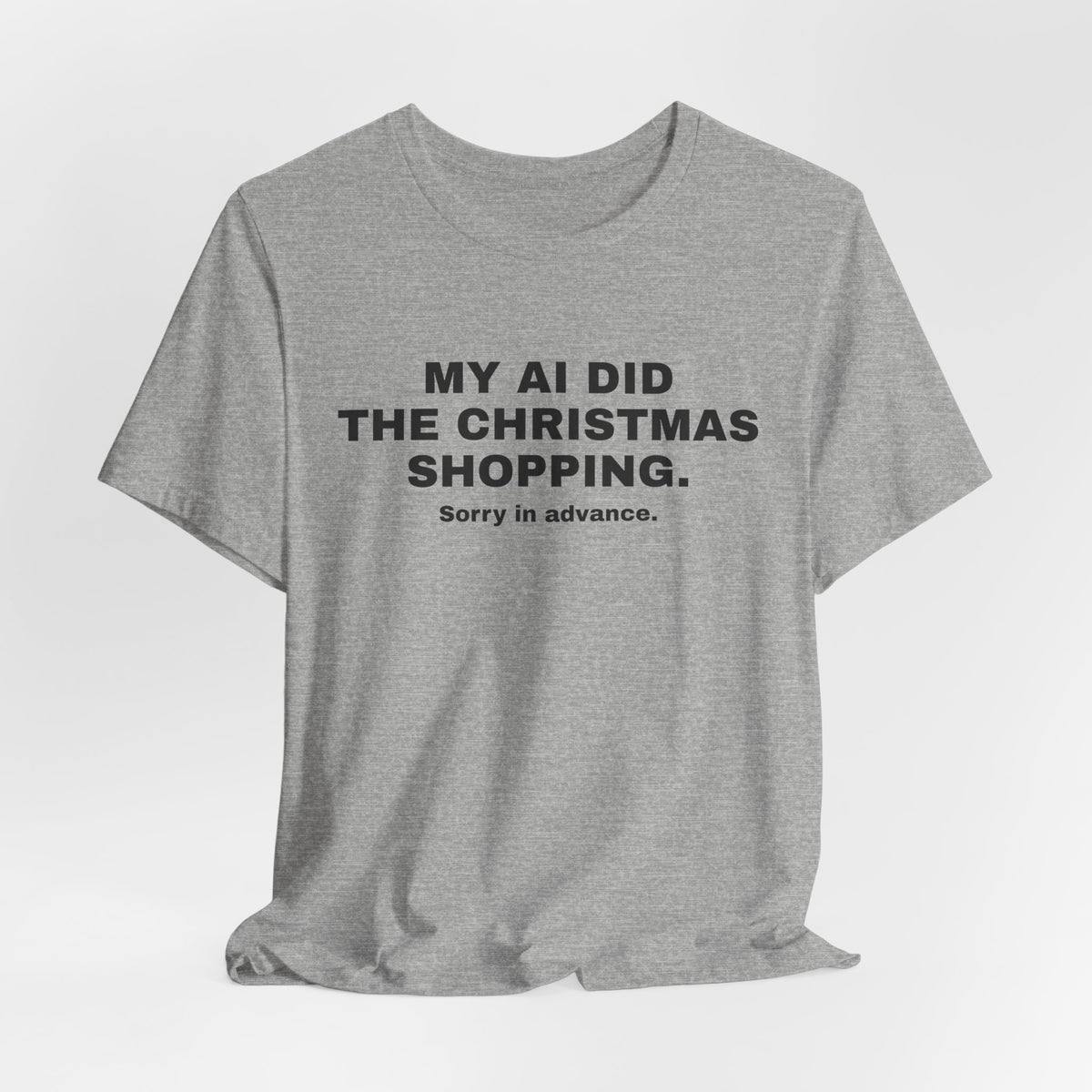 Athletic heather t-shirt printed with 'My AI Did the Christmas Shopping. Sorry in Advance.'