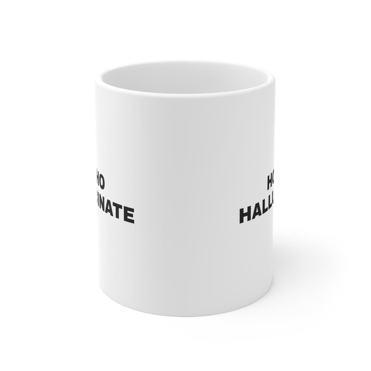 White mug printed with 'Ho Ho Hallucinate'