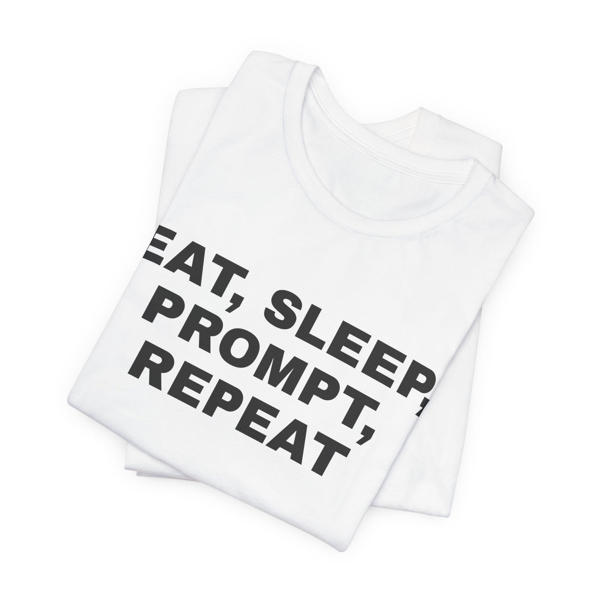 White t-shirt printed with 'Eat, sleep, prompt, repeat', folded