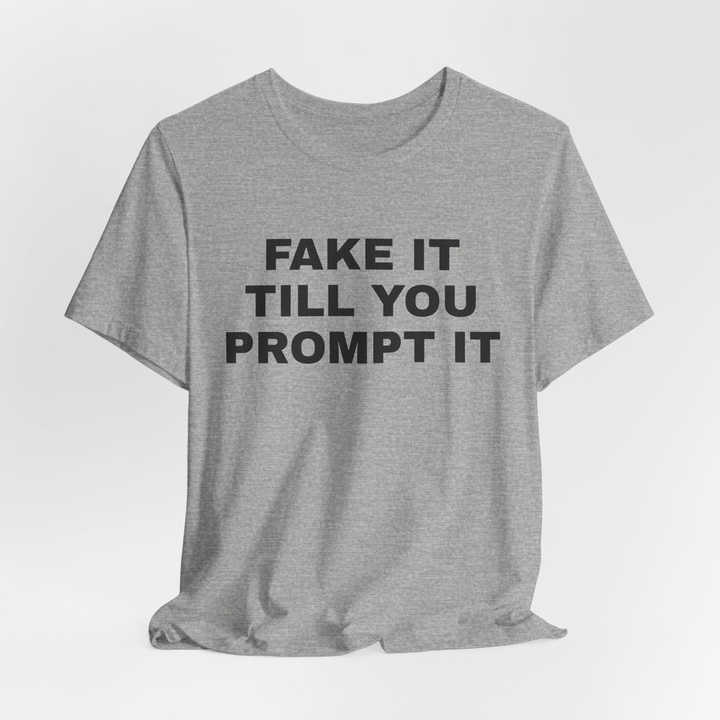 Athletic heather t-shirt printed with 'Fake it till you prompt it'