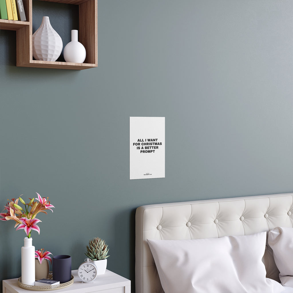 Wall print reading 'All I want for Christmas is a better prompt', shown on a wall at home