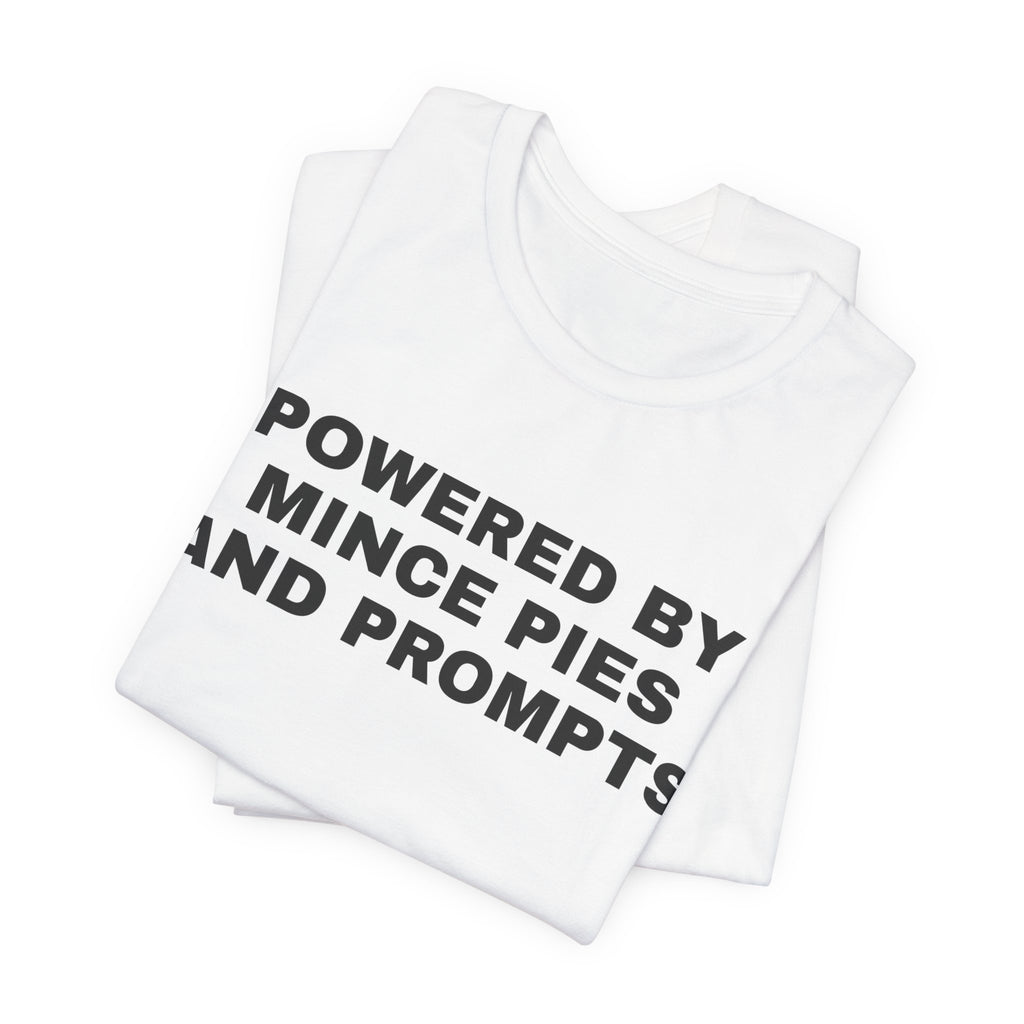 White t-shirt printed with 'Powered by Mince Pies and Prompts', folded