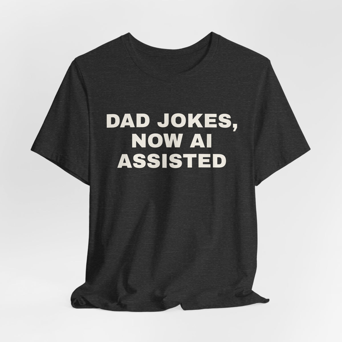 Dark grey heather t-shirt printed with 'Dad jokes, now AI assisted'