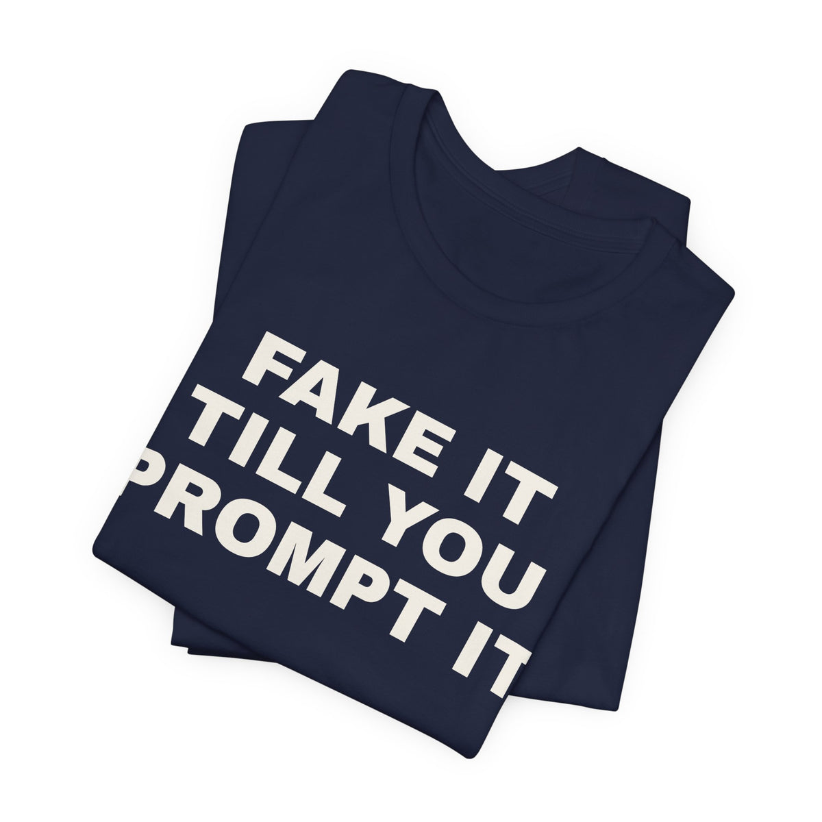 Navy t-shirt printed with 'Fake it till you prompt it', folded