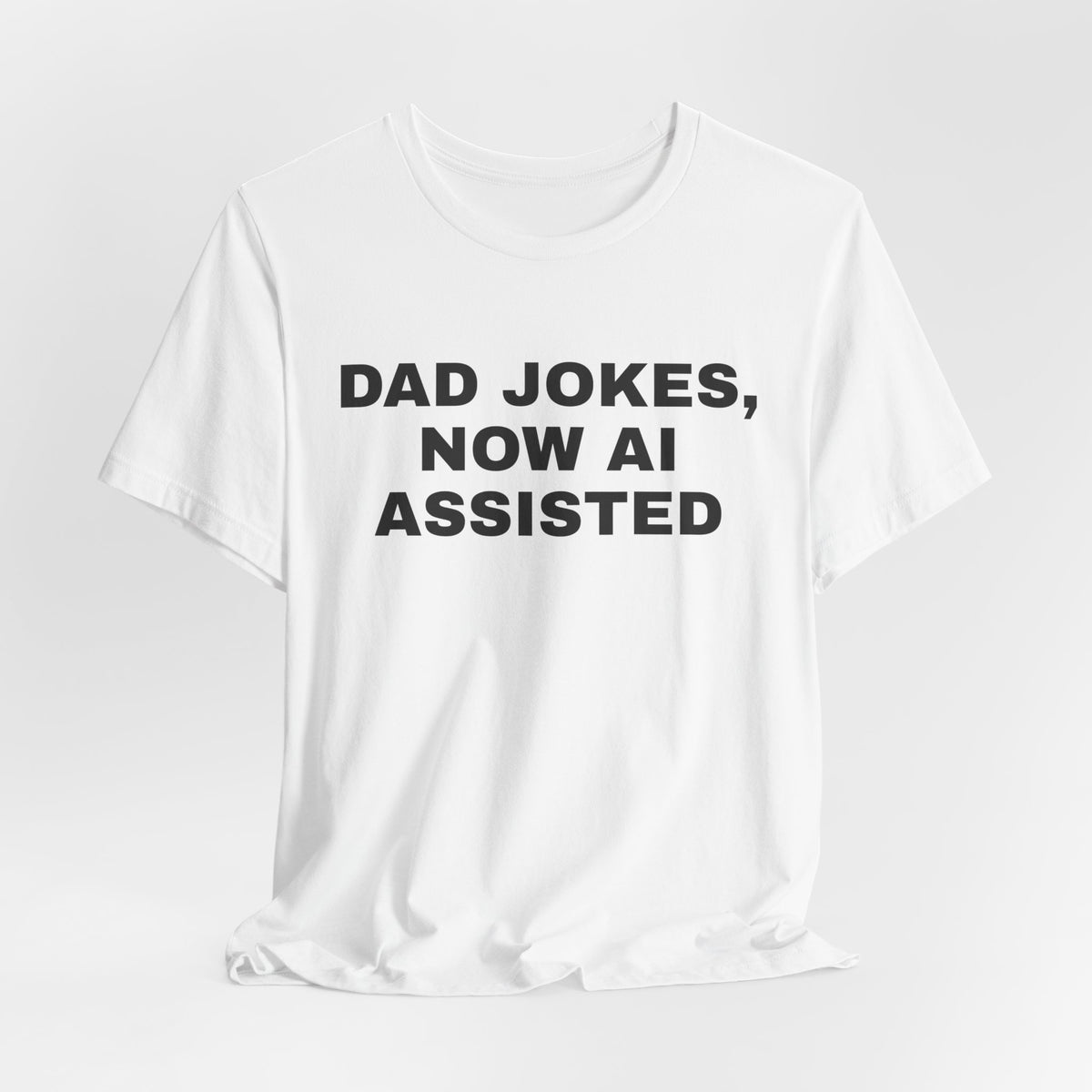 White t-shirt printed with 'Dad jokes, now AI assisted'
